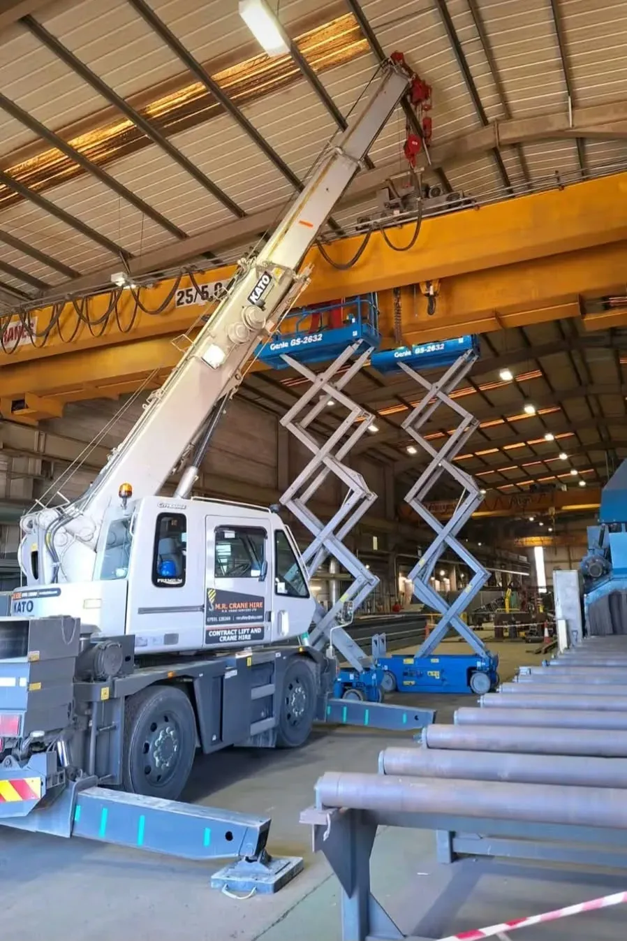 M.R. Crane Hire Kato compact crane working inside an industrial building